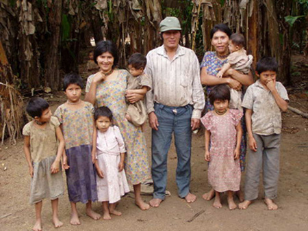 photo: A Tsimane husband, two wives, and children